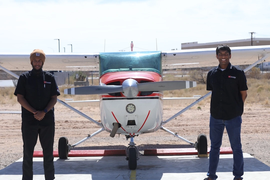 CFIs at Red Arrow standing next to Cessna