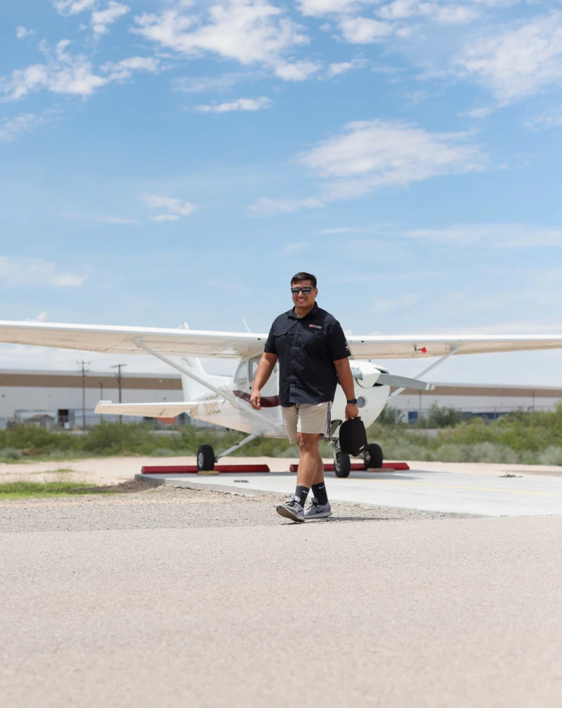 CFI and student pilot in front of a Cessna 172 at the Dona Ana County International Jetport (KDNA)