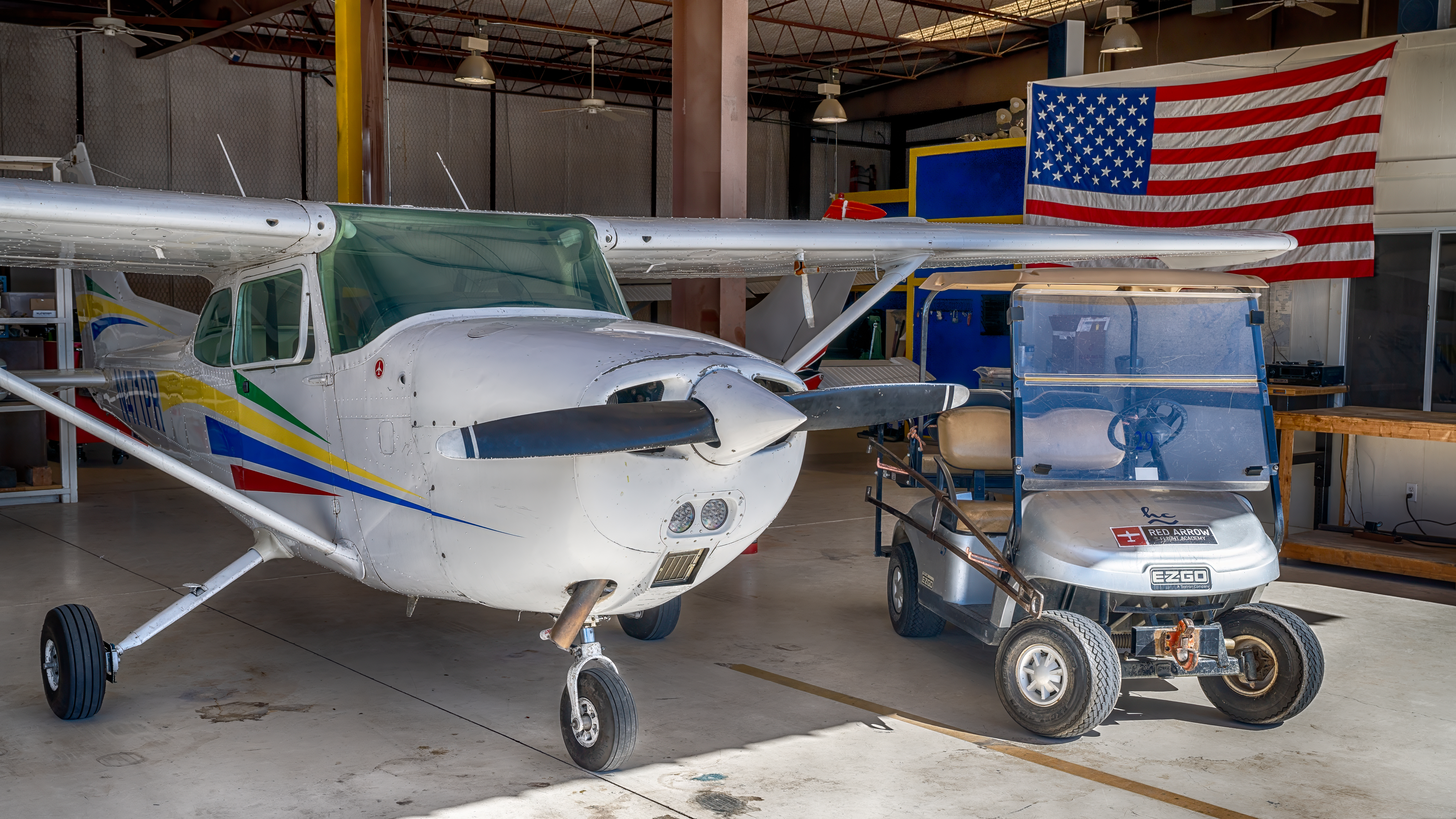 Red Arrow Aircraft and American Flag